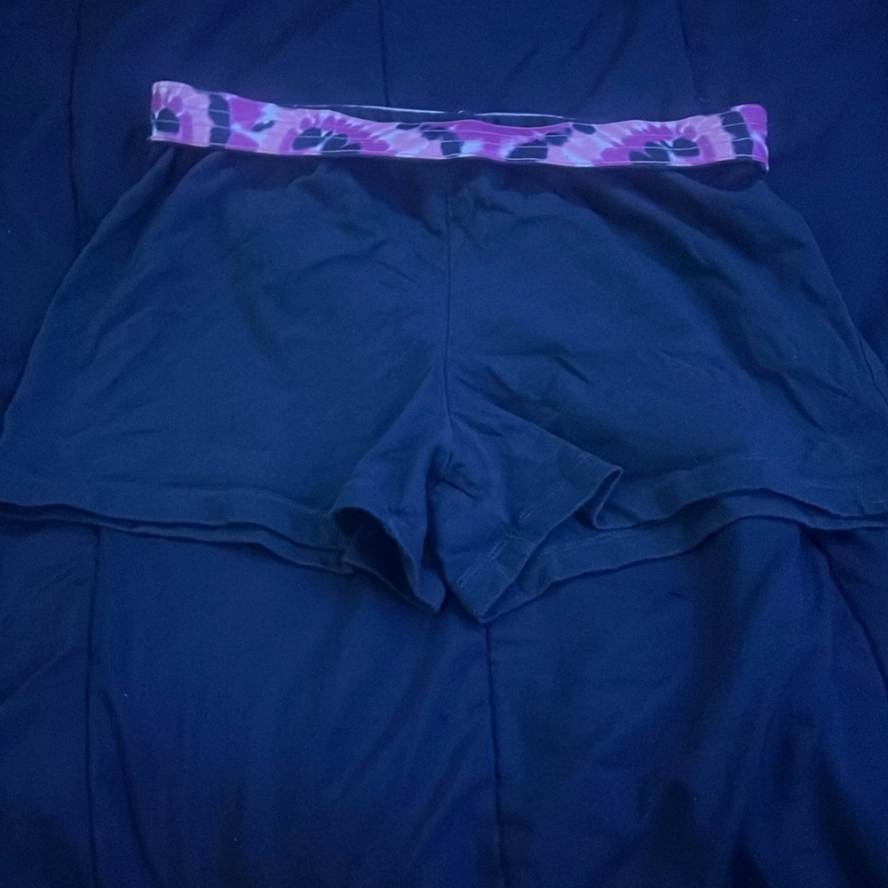Navy blue shorts with a tye dye waistband